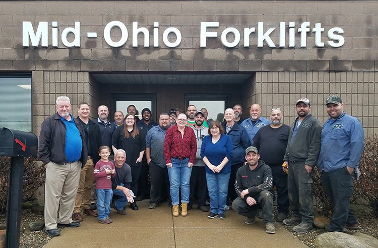 Team at Mid-Ohio Forklifts Assembled in Front of Building